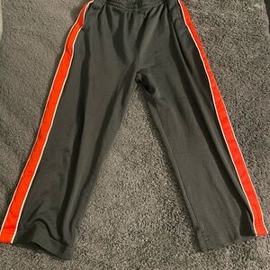 Kids Black Athletic Track Pants with Red Side Stripe
